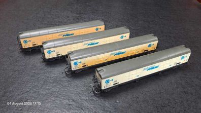 Set of four double-bogie HO scale Lima wagons
