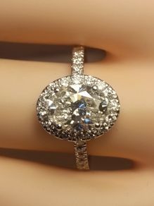 14ct White Gold Oval Brilliant Cut Lab Diamond Ring with a Halo of Diamonds