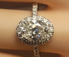 14ct White Gold Oval Brilliant Cut Lab Diamond Ring with a Halo of Diamonds