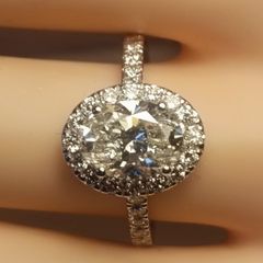 14ct White Gold Oval Brilliant Cut Lab Diamond Ring with a Halo of Diamonds