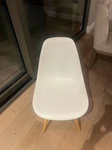 4 Eames style white chairs