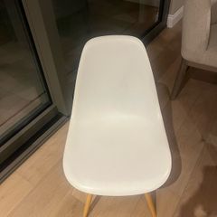 4 Eames style white chairs