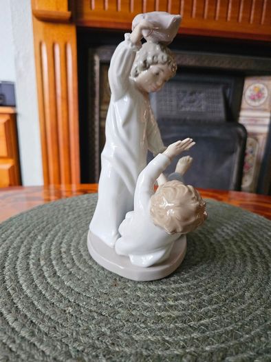 NAO by Lladro "Pillow Fight" Figurine
