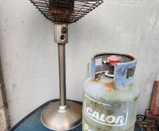 Gas Patio heater with gas cylinder.