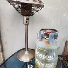Gas Patio heater with gas cylinder.