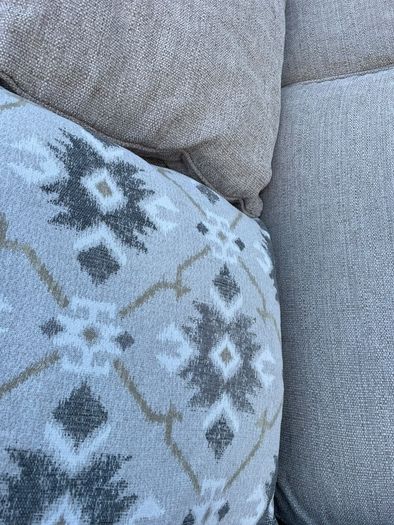 Beige L shaped corner sofa