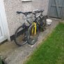 2 bikes silver one medium black one large Image 2