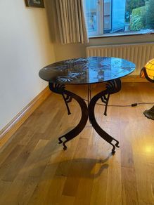 Unique artisan metal side table with native motifs