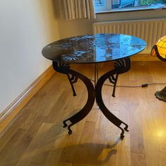 Unique artisan metal side table with native motifs