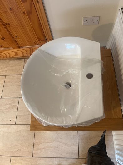 bathroom sink , pedestal and tap