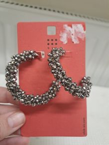 Large decorated hoop earrings