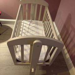 Like new cot with new mattress