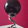 Obsidian glass ball and metal Serpent stand. Image 3