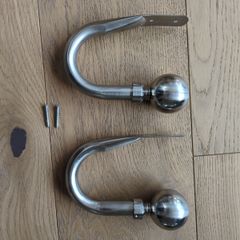 Brushed steel curtain hold backs/tie backs