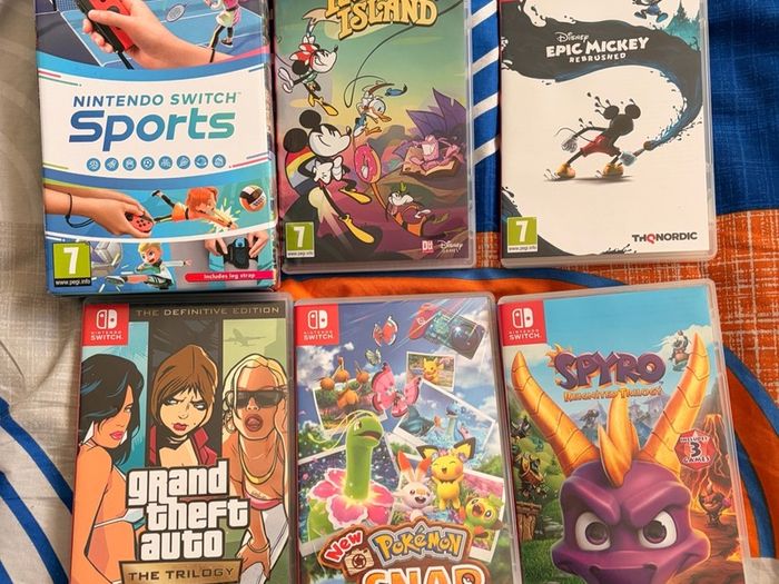 Nintendo Switch OLED includes console, 13 Games and Lots of Accessories/ additions
