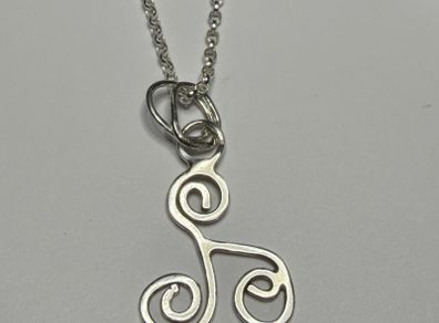 Sterling silver Triskele pendant on 18 or 20 inch chain.
