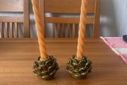 Two candle holders with real candles