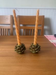 Two candle holders with real candles