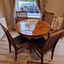 Round wooden table and four chairs Image 2
