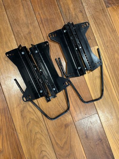 Universal seat rails + bucket seat side mounts