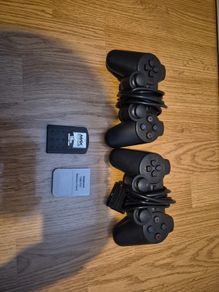 ps2 controllers plus ps2 and 1 memory cards