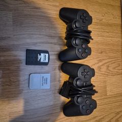 ps2 controllers plus ps2 and 1 memory cards