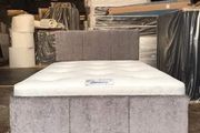 Double grey divan beds with footboards