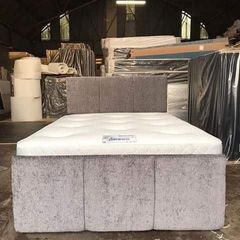 Double grey divan beds with footboards