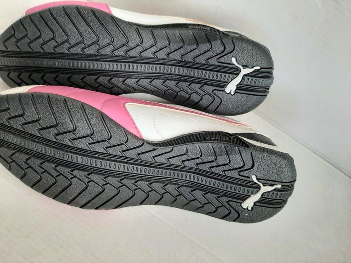 New pink white and navy junior puma trainers