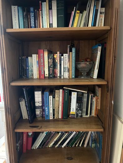 Solid wood bookshelf with bottom drawer