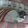 Beautiful vintage parrot brooch covered with rhinestones with enamel accents. Image 4