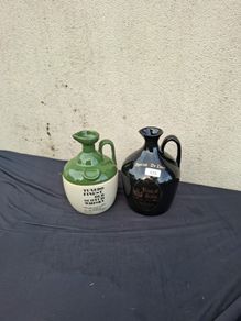 Duo whiskey bottles possible to post