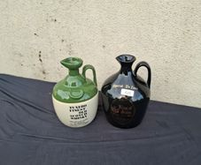 Duo whiskey bottles possible to post