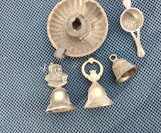 Old brass bells & candle holder & tea strainer