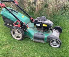 Qualcast lawnmower, self propelled, electric start.
