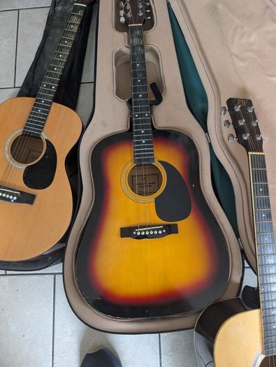 Three acoustic guitars