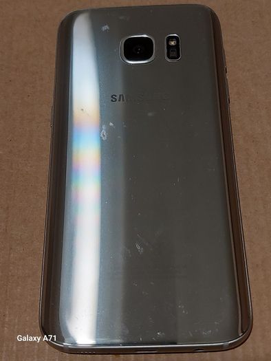 Samsung S7, SM-G930F, Not Powering On, sim tray missing, for parts or repair, excellent cosmetic condition