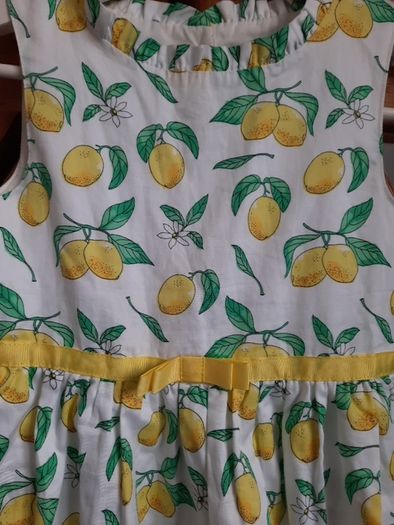 Girls lemon dress size 6-7 years