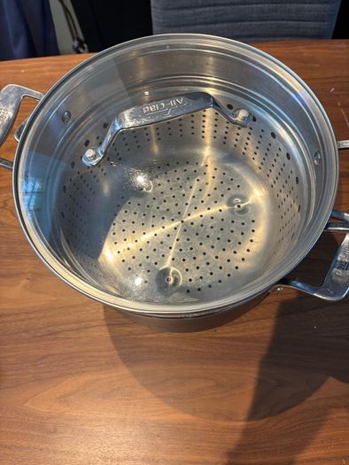 Set of All Clad pots and pans