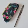Vintage 1960s black purse with floral pattern pink green lipstick make up brass clasp retro Image 5