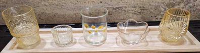Decorative glasstealight holders on  wooden base