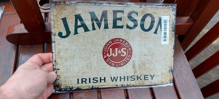 Jameson irish advertising whiskey metal repo sign  ,,buyer collects or pays postage thank you, lovely advertising display item, nice for home bar or man cave pub restaurant etc, or present, sold as seen .