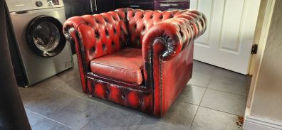 Red leather Chesterfield armchair