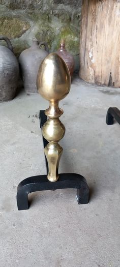 Antique Fire dogs and 4 piece fire set solid brass tops and steel
