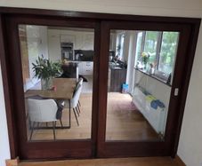 Solid glass sliding doors