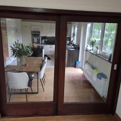 Solid glass sliding doors