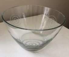 Heavy glass bowl with swirl pattern