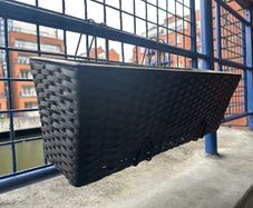 Plant hangers for balconies and fences