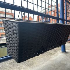 Plant hangers for balconies and fences