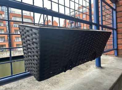 Plant hangers for balconies and fences